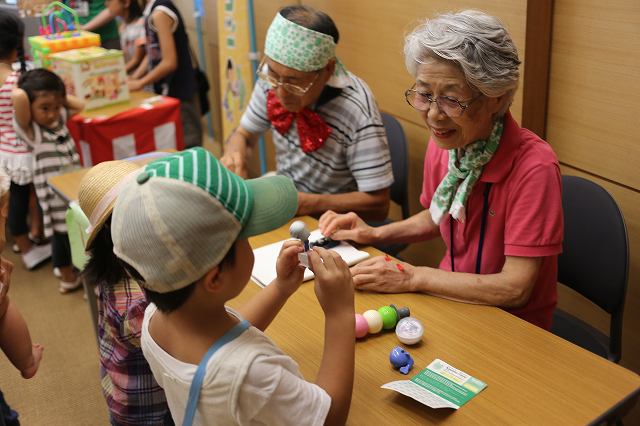 140814 レジ、小松さん.jpg